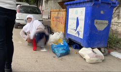 Dilenci kadın, zabıtadan kurtulmak için caddeye tuvaletini yaptı